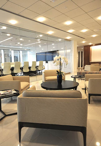 Photo of office lobby with chairs and table