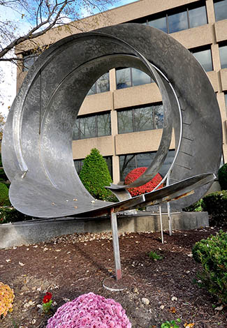 Closeup of metal sculpture in front of Kevon Office Building